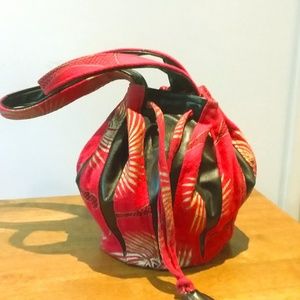 RED/GOLD/BLACK COTTON WITH BLACK LEATHER BAG